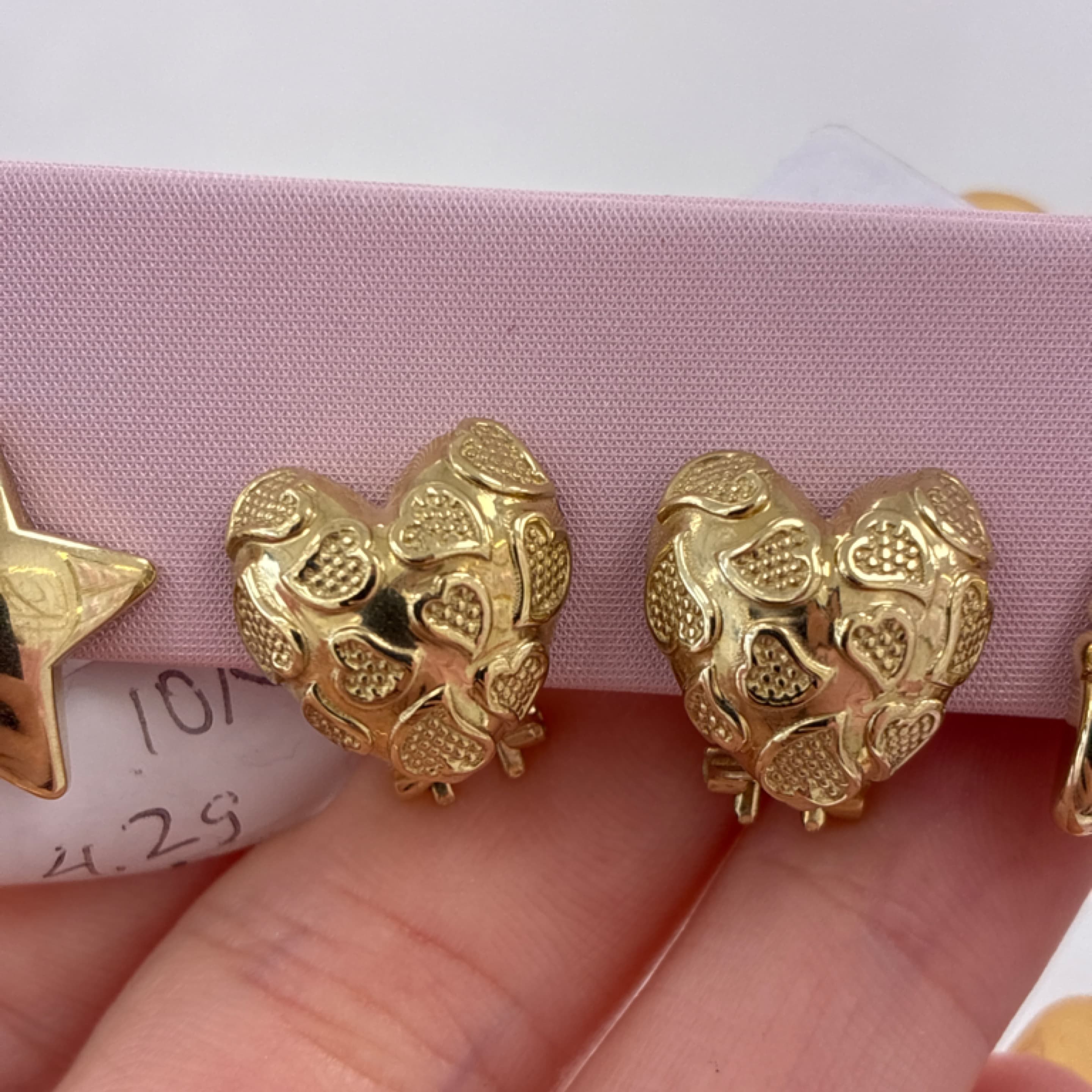 Heart earrings with several hearts inside with omega closure 10KT